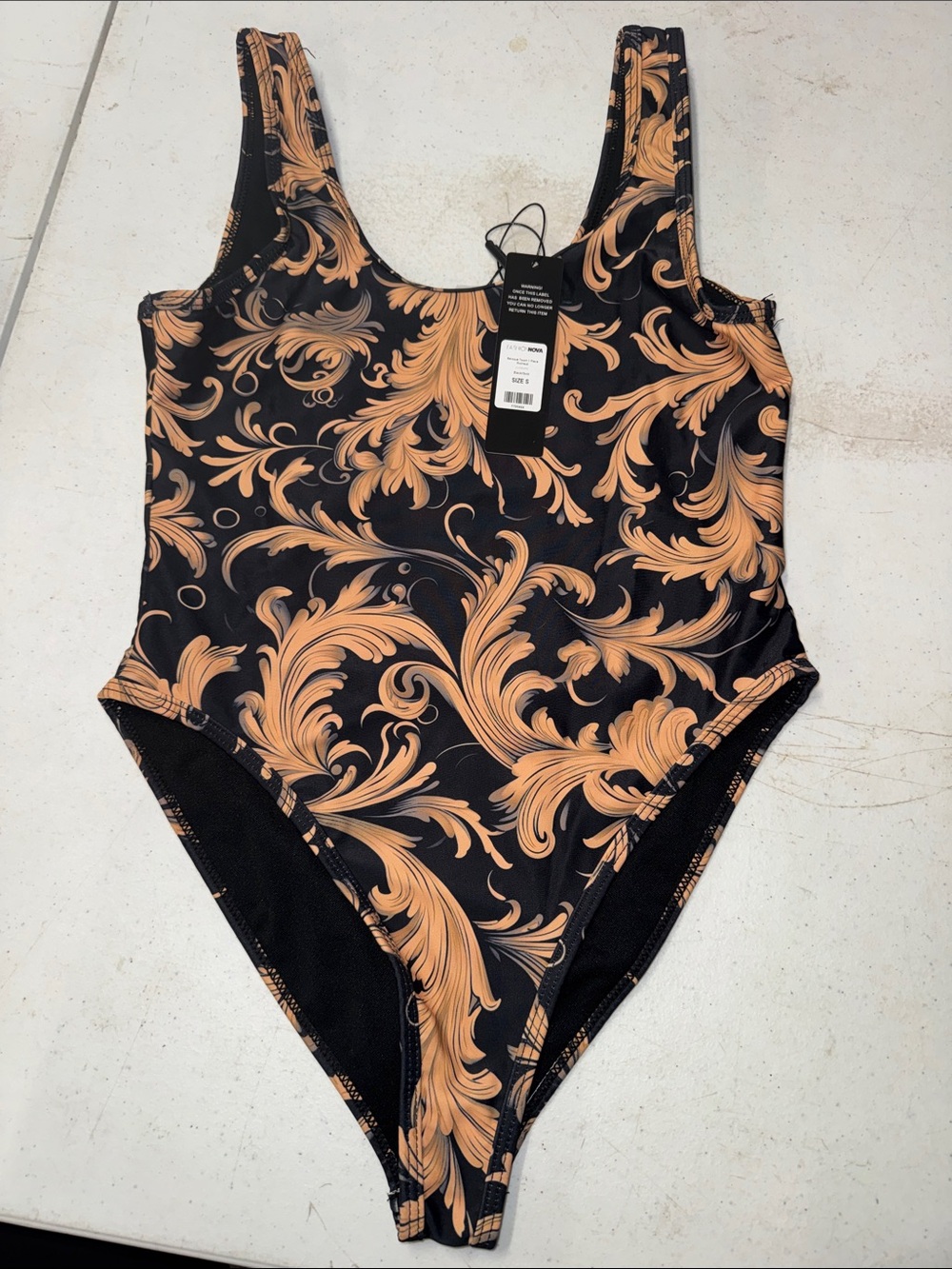 Fashion Nova Black and Tan Baroque Swirl One-Piece Swim